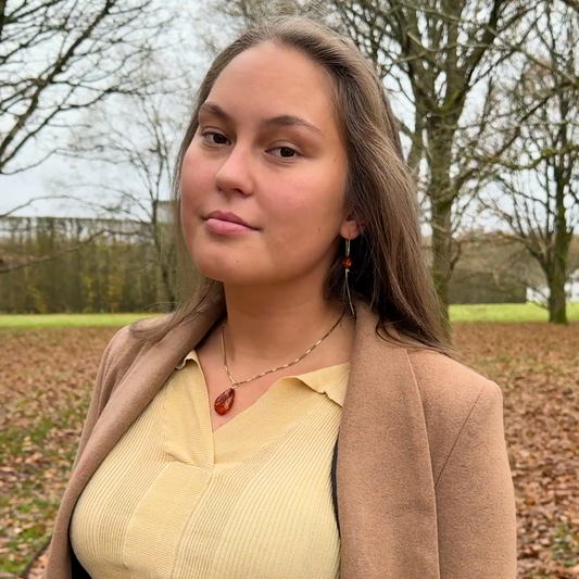Wine red amber and 14kt gold pendant